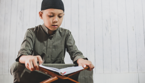 muslim-boy-reading-holy-quran-2021-08-30-07-25-36-utc-1